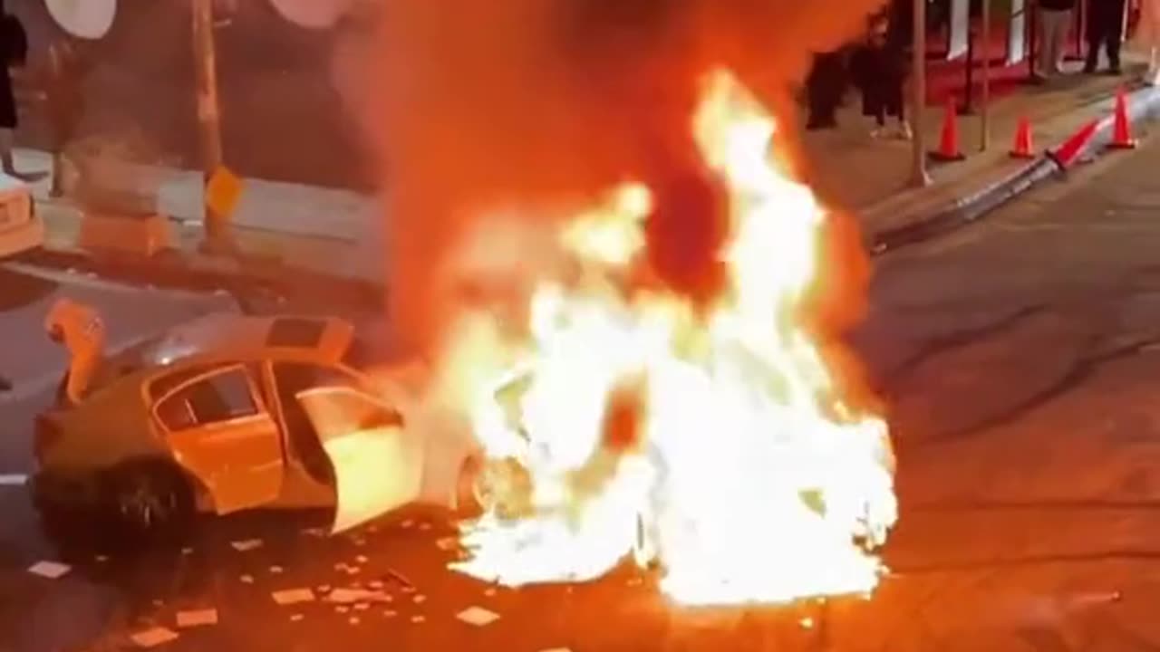 Vehicles On Fire And Explosions Taking Place At A Street Takeover, Los Angeles