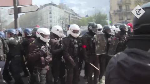 French protesters with flares storm BlackRock offices in Paris