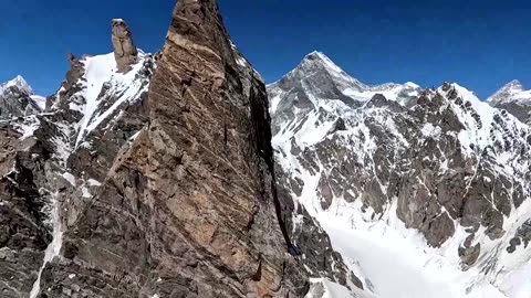 Pilots make history by paragliding to K2 mountain