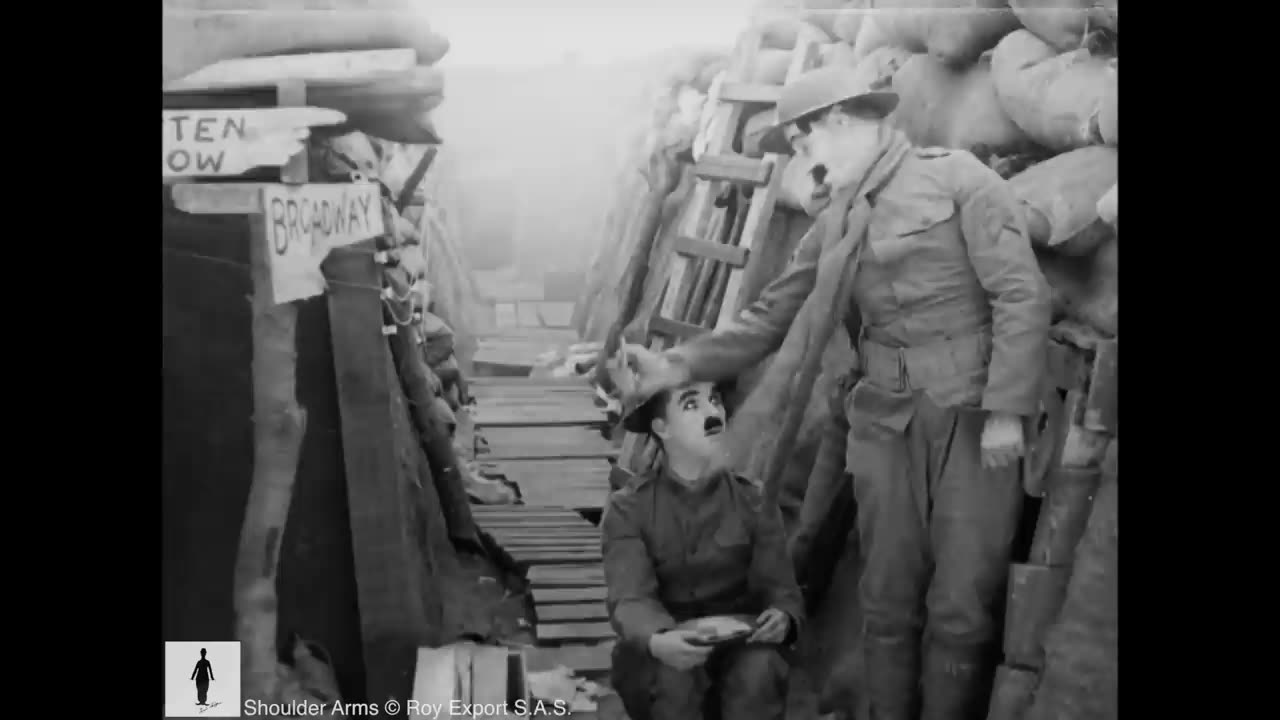 Charlie Chaplin in the trenches ( Shoulder arm ) | Celebraty World