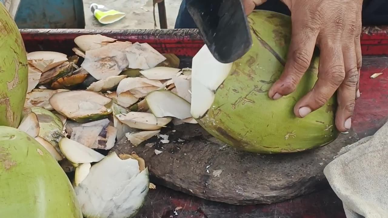 How to peel Coconut on the street