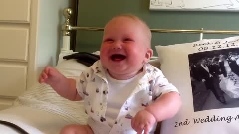 Baby laughing and chuckling