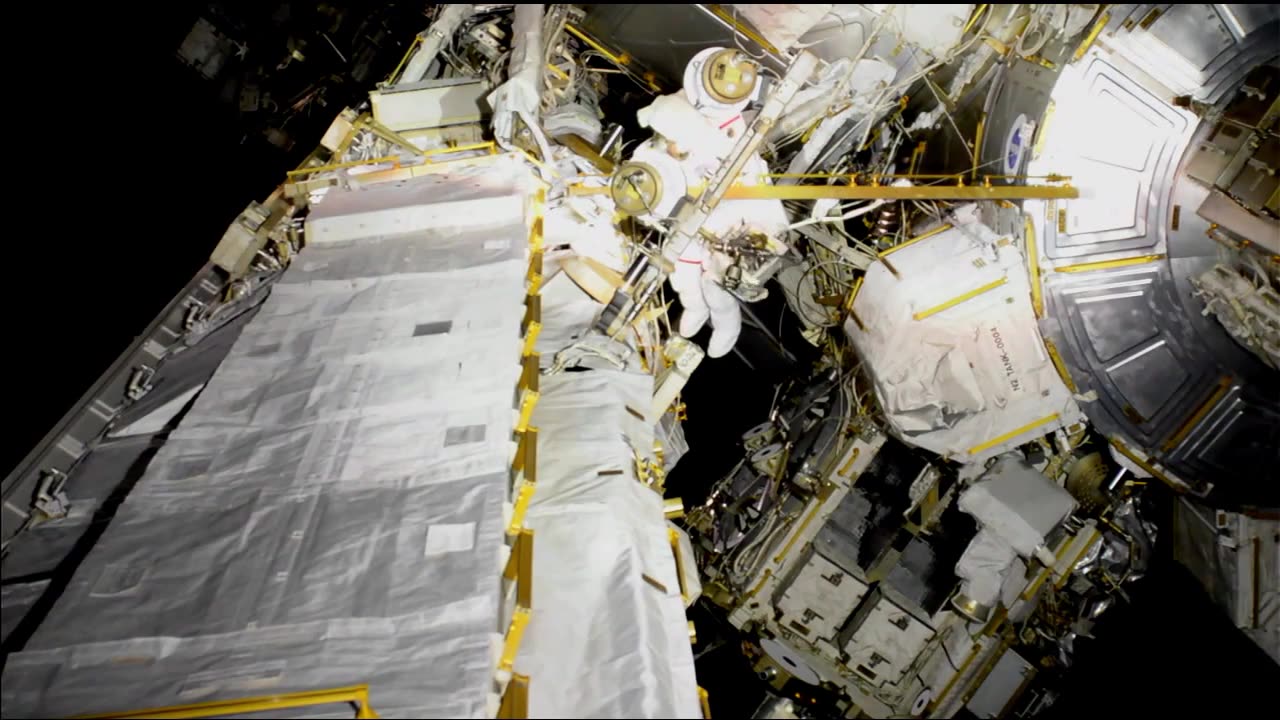 Astronauts Walk in Space Outside the Space Station.