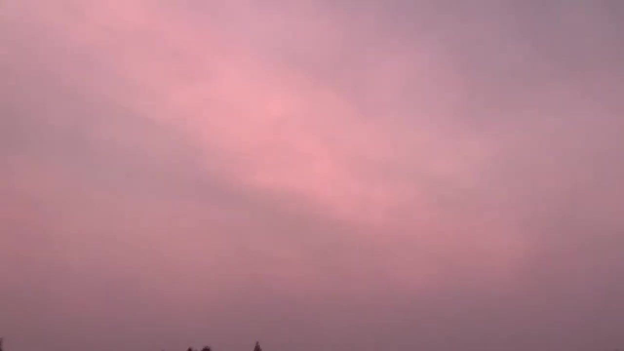 Smoke and weird color in the sky