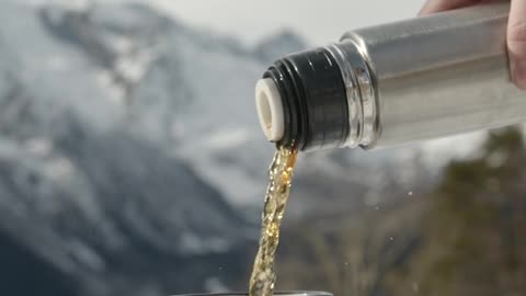 Pouring a Hot Drink on a Cold Day