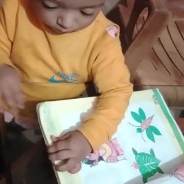 My Baby Reading A Book