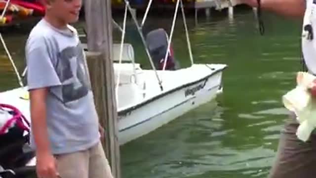 Fish grabs men's arm! (The original video)