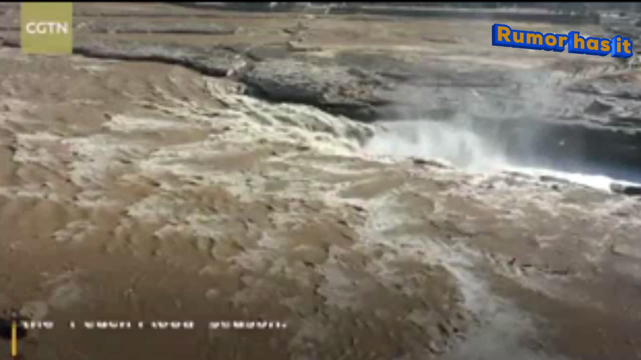 Rainbows crown Hukou Waterfall during 'Peach Flood' season in north China