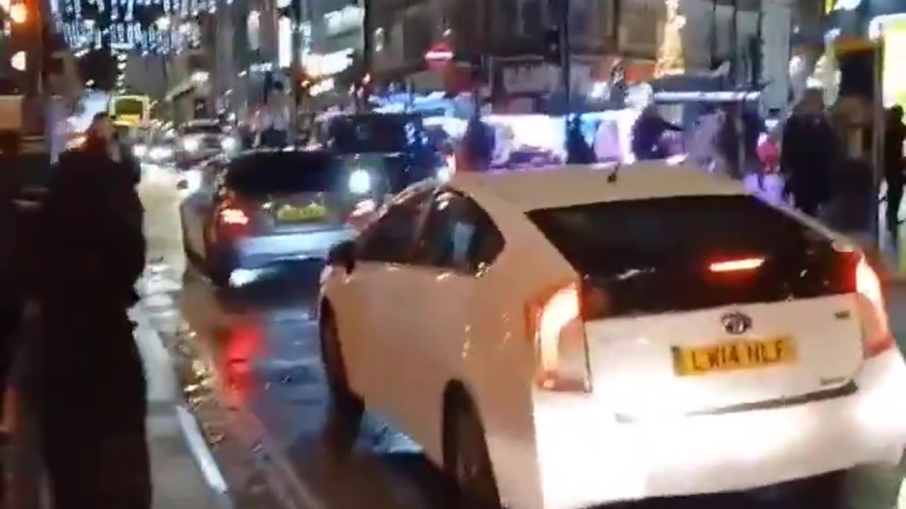 Christmas time in "Modern London" and convoys of Muslims drive around