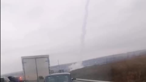 Ukrainian Civilians Stop Traffic to Watch HIMARs