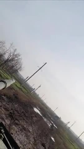 Missile flies past Ukrainian tanks