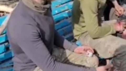 Ukraine: captured Ukraine soldiers. Both are very skinny.