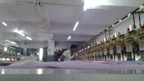 Embroidery worker