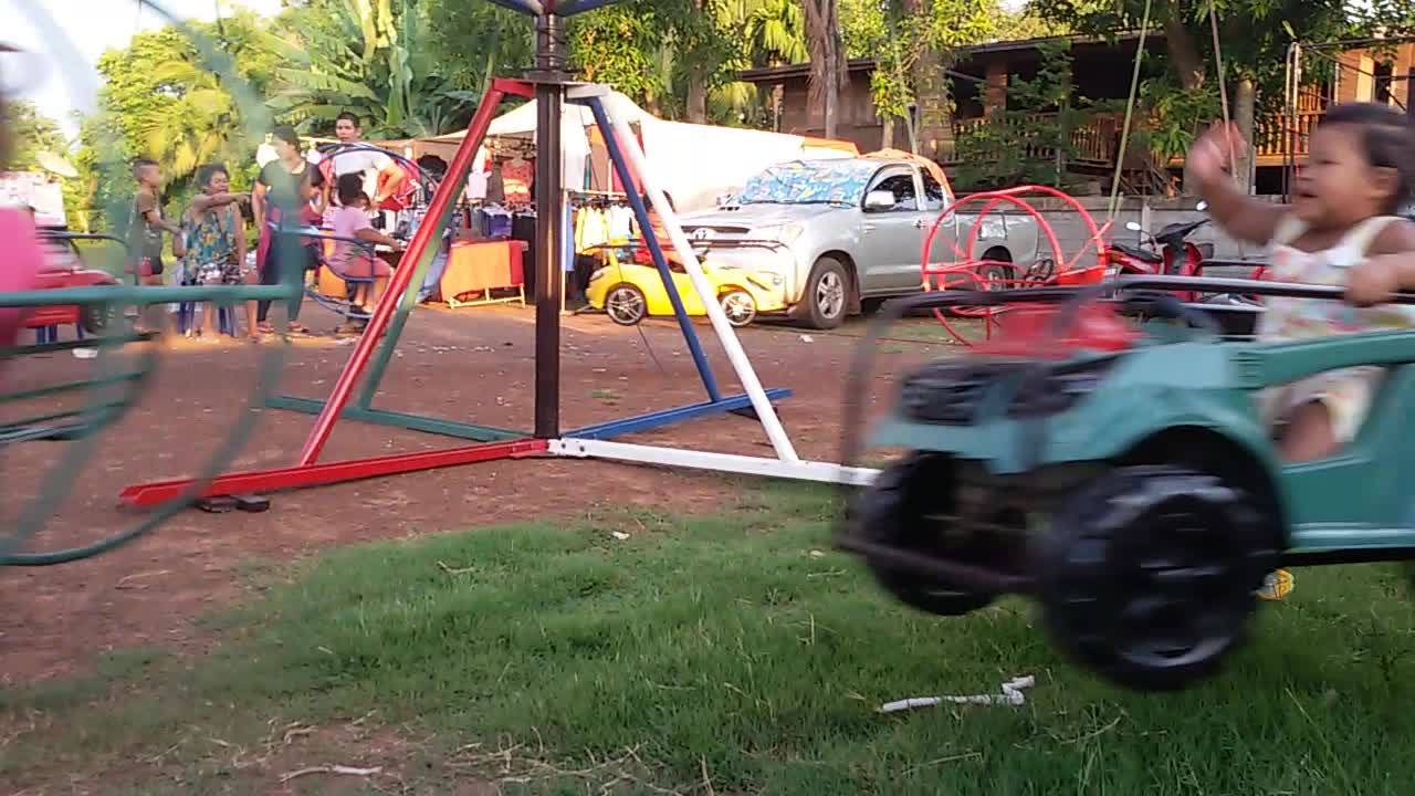 Pug Kicks It On A Carousel With His Friends