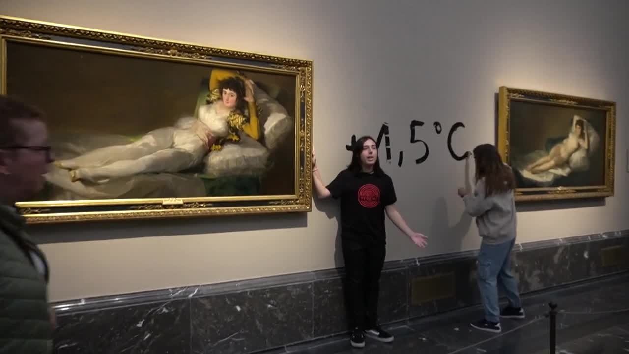 Climate activists glue hands to Goya frames at Prado museum in Madrid