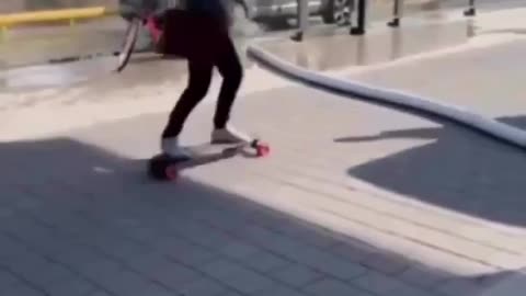 dude on electric skateboard hits pump hose at full speed