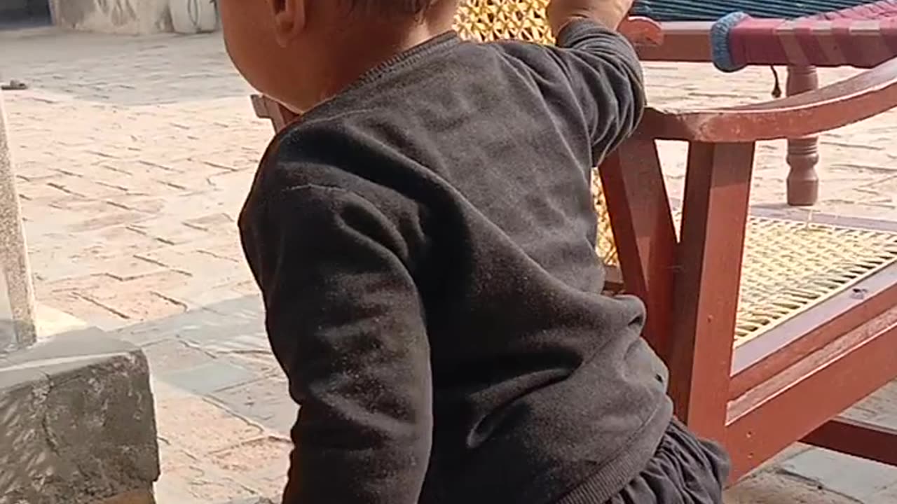 #Cute baby playing with chair