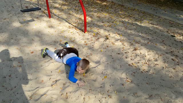 Boy and Puppy Share a Playful Moment!