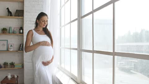 Pregnant young mom waiting for her baby