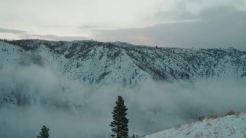 A Dark and Snowy Day In The Mountains