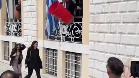 Women Walk In Middle Of Vase Breaking Ceremony