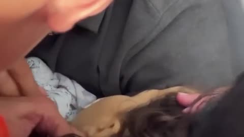 Palestinian mother holds onto hair tie of daughter slain by Israel.mp4