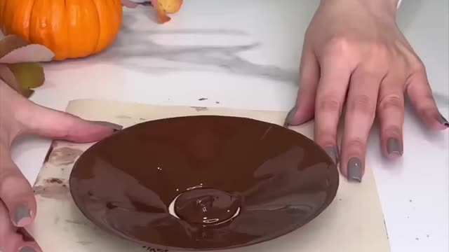 Chocolate cup with pumpkin spice latte mousse