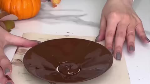Chocolate cup with pumpkin spice latte mousse