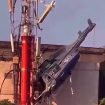 Helicopter flys into five g death tower