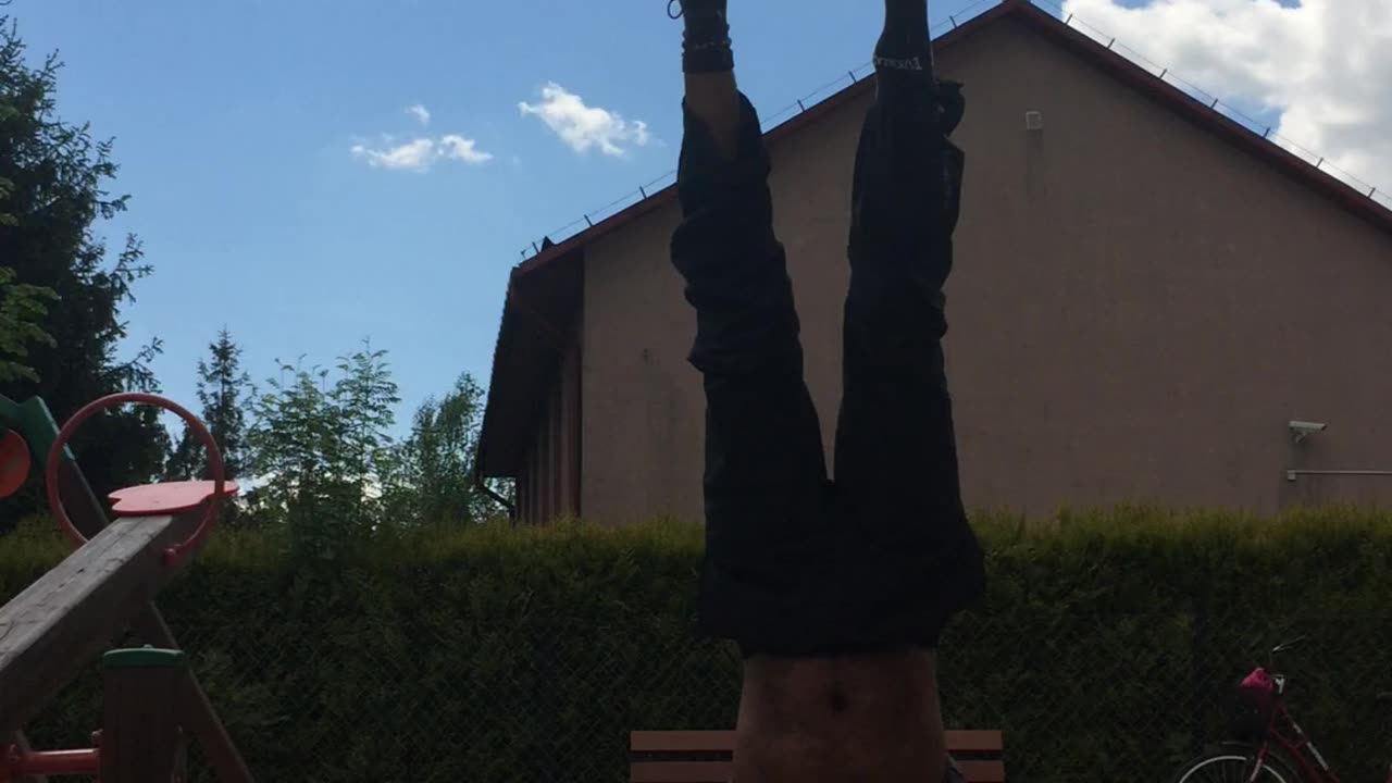 Delagande headstand in Poland