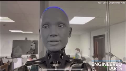 A humanoid robot interacts with a human and admits sadly it will never experience real love