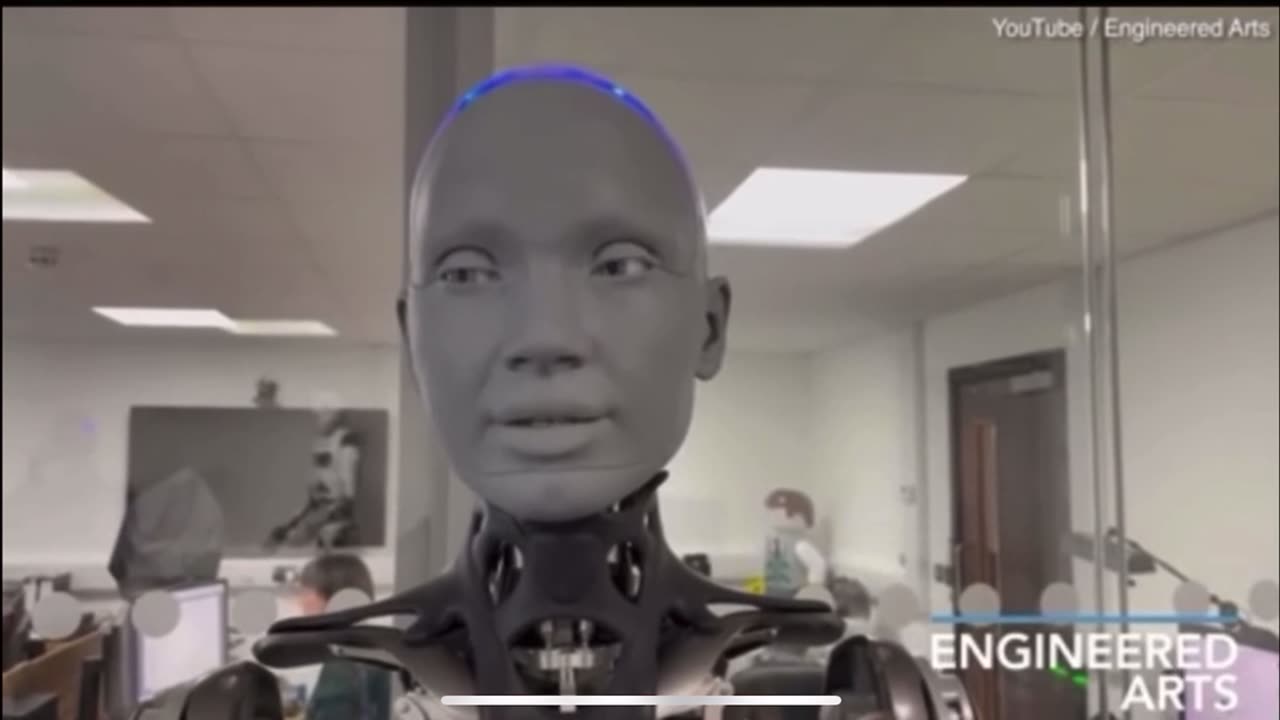 A humanoid robot interacts with a human and admits sadly it will never experience real love