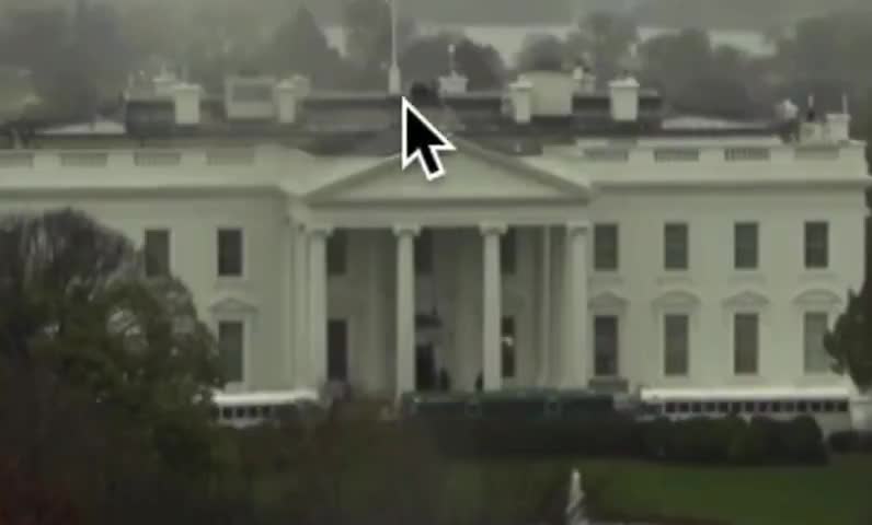 Military buses in front of and snipers on top of, the White House