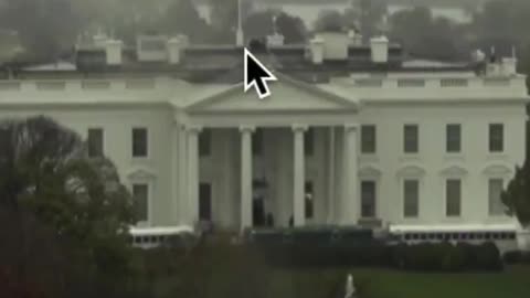 Military buses in front of and snipers on top of, the White House