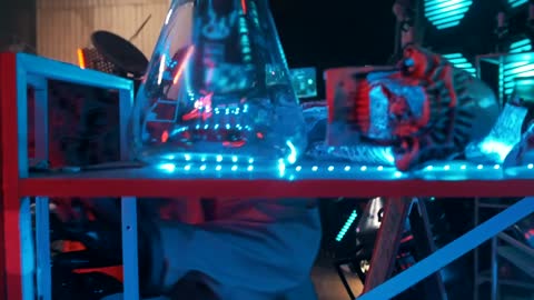 An alien with tentacles looking at laboratory equipment