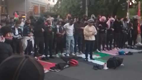 Muslims pray on the road London