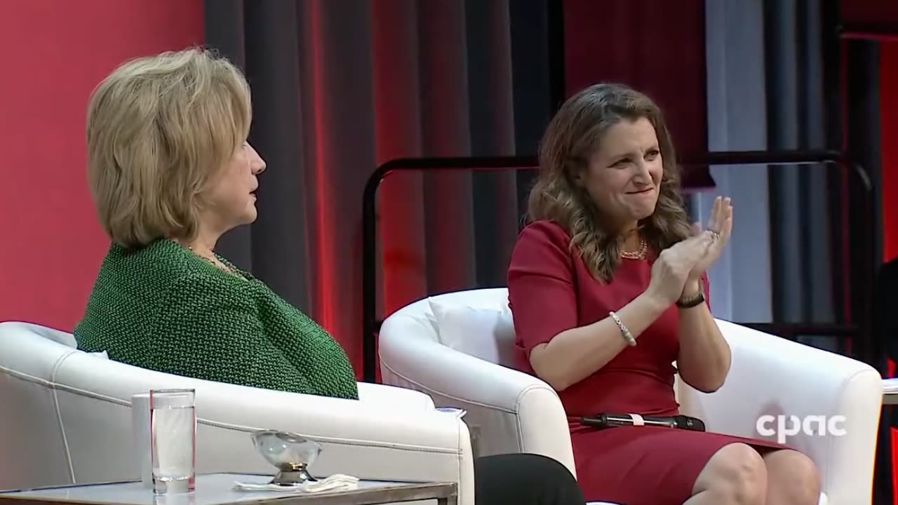 Hillary Clinton gets a standing ovation after she says "The best way to end Putin's aggression is for Ukraine to win, and that means we have to give them more help."