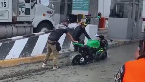 Motorcycle in wet concrete