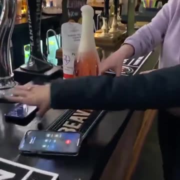 Radiation Generated by 2 Standard-Issue Smartphones is Enough to Heat and Pop a Bottle of Champagne