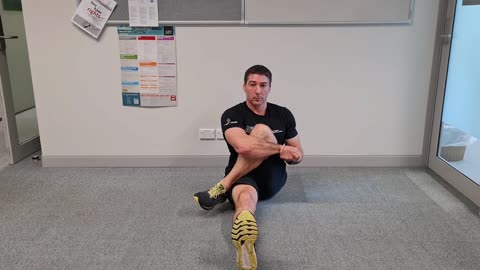 Seated glute med stretch