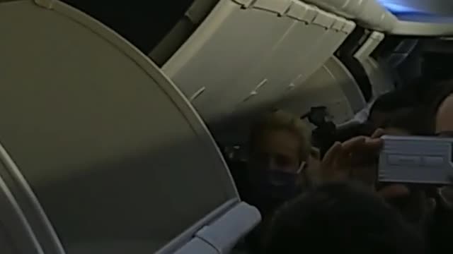 The passengers of the plane are preparing to leave