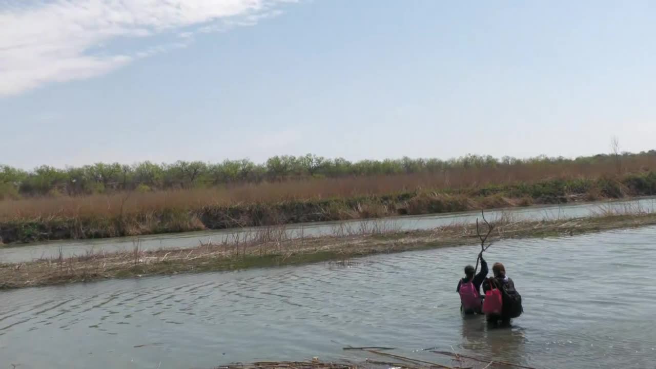 'They Keep Coming': Footage Of Migrants Crossing River Into U.S.