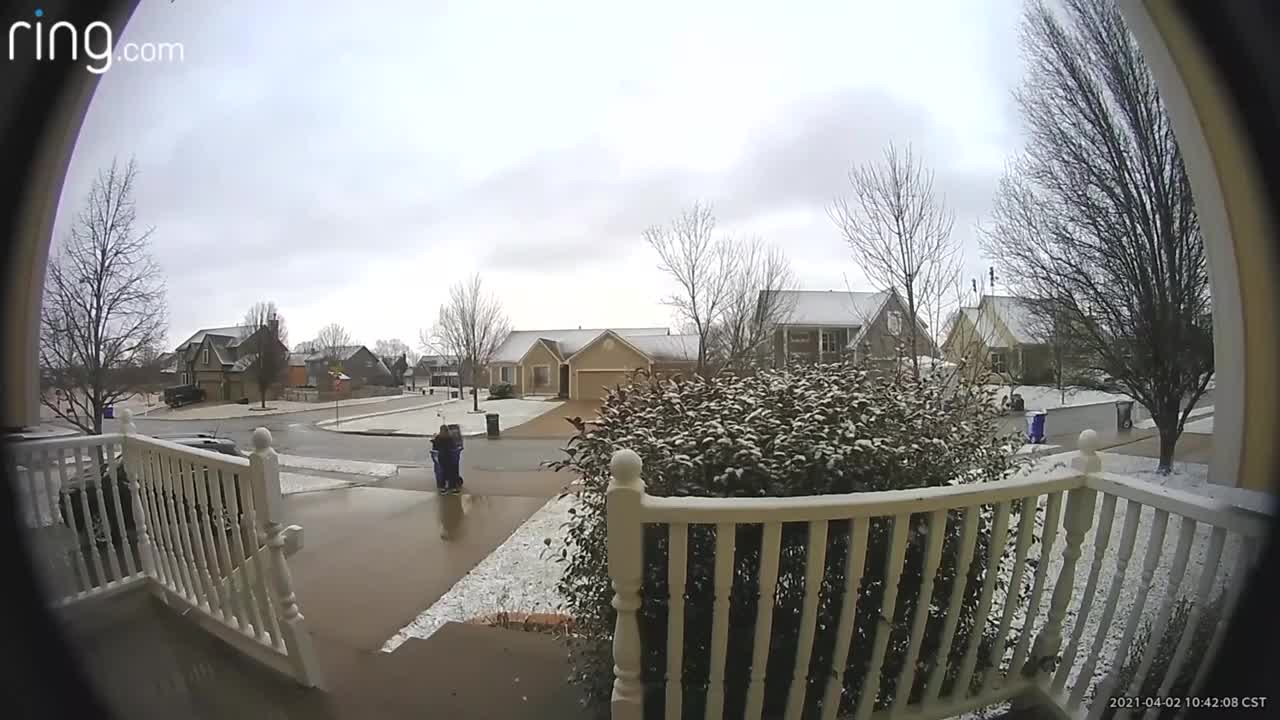 Strong Air Makes Trash Can Lid Slam Woman's Face