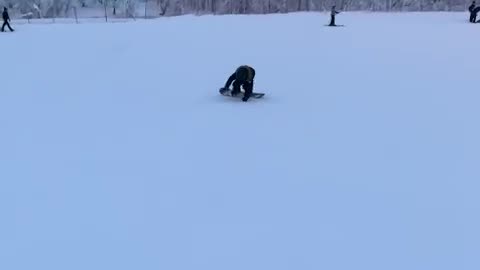 Thomas snowboarding