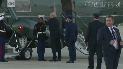 Trump stops to retrieve Marine's hat