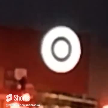 Man let's go of roof and falls to the ground at Target in Omaha Nebraska