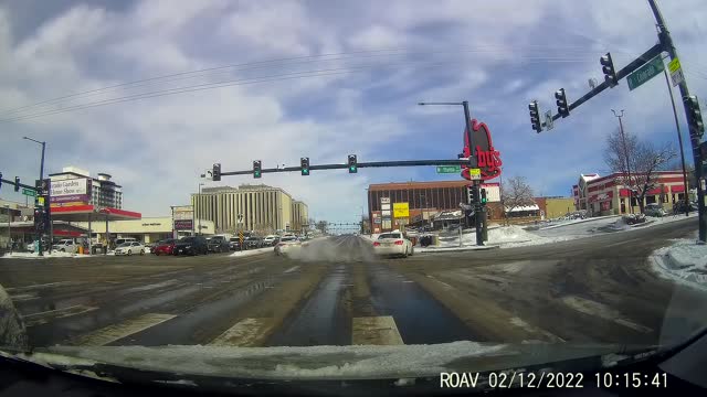 Red Light Runner 'Slides' Through Intersection