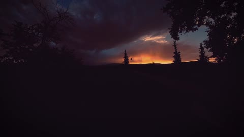 Timelapse of Sunset over mountains