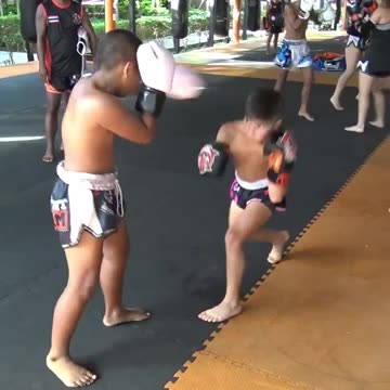 Sparring of young Muay Thai