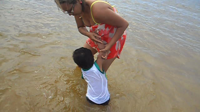 Baby taking a walk in the Araguaia River